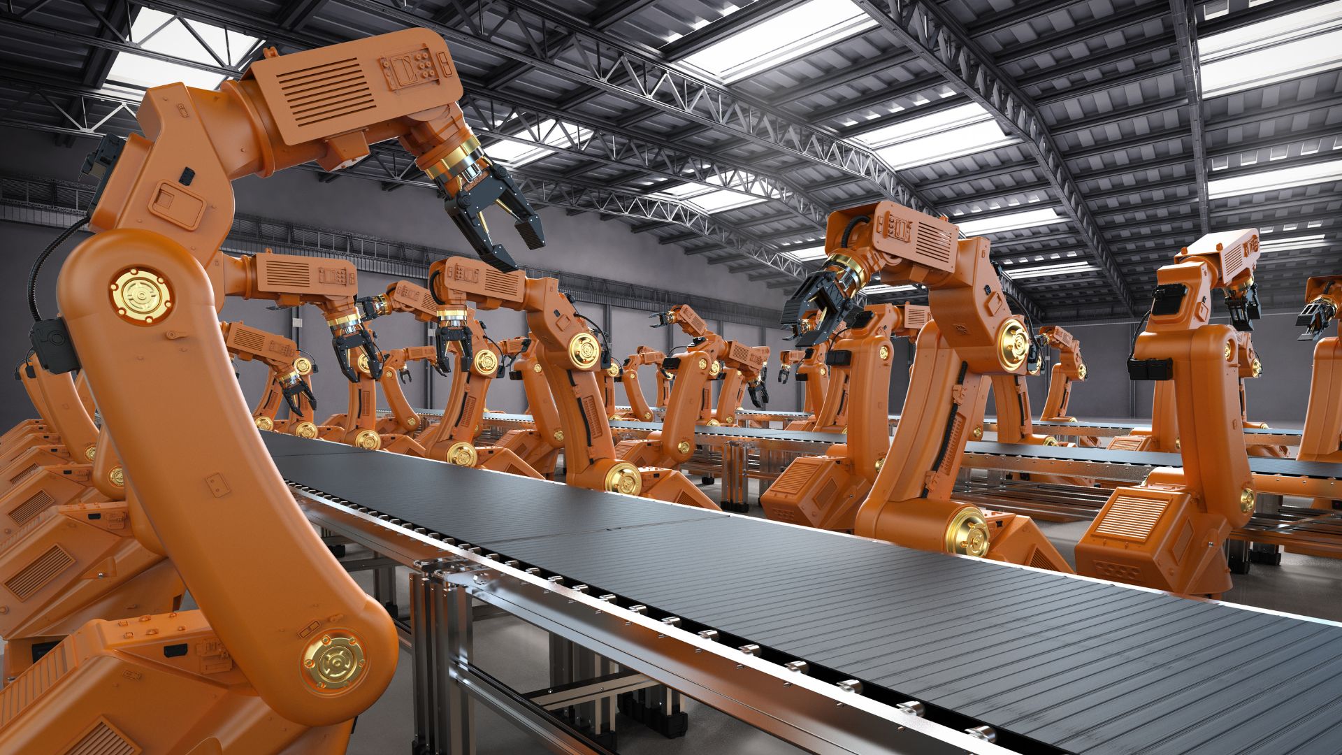 Linea di produzione automatizzata con numerosi bracci robotici arancioni disposti lungo un nastro trasportatore.