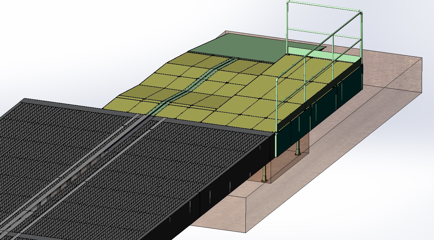 Vista 3D di una struttura modulare industriale con piattaforma di movimentazione e sistema di sicurezza perimetrale.
